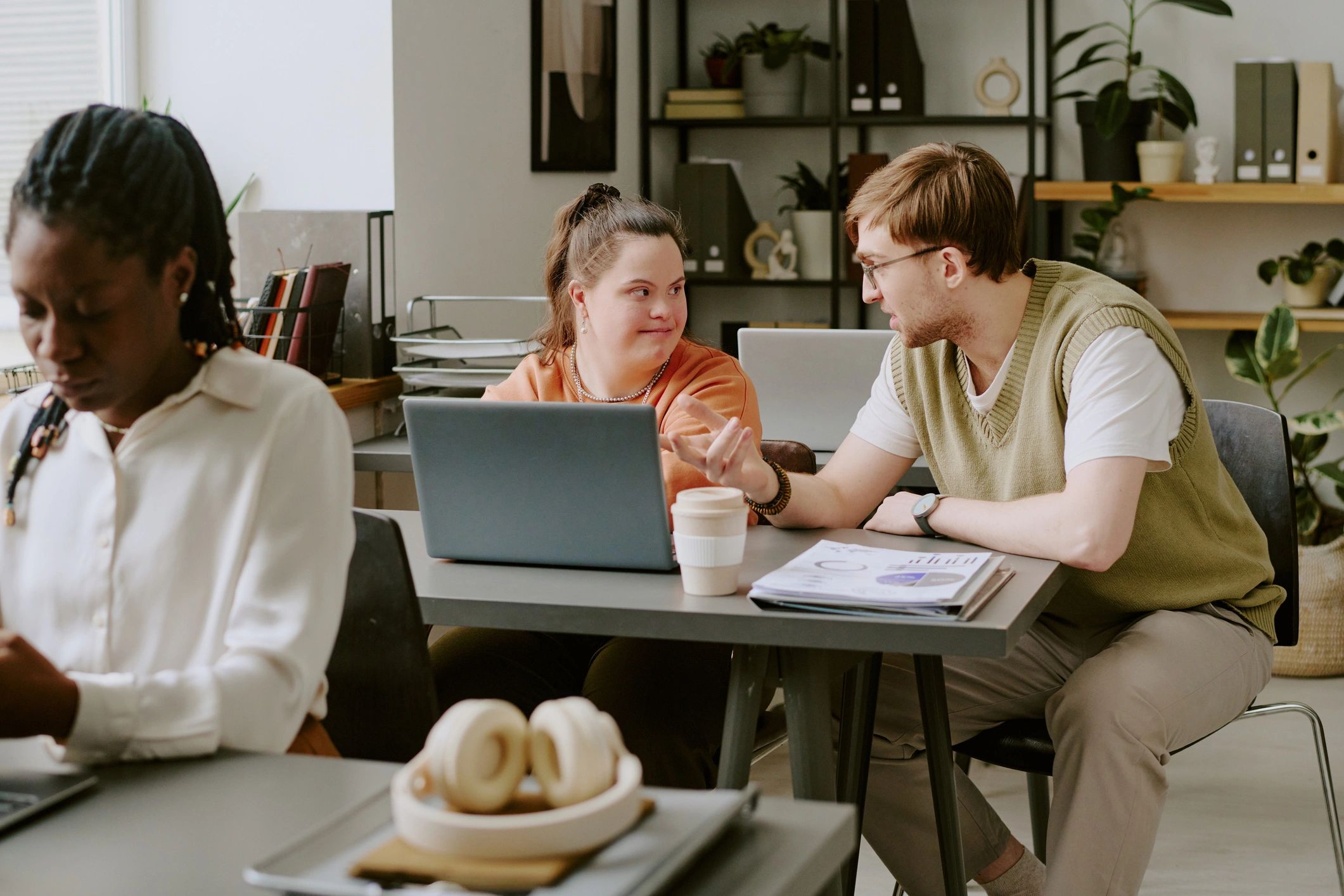 Team members discussing information review in an office